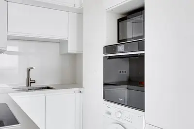 Cuisine ou kitchenette dans l'établissement Suite Mitterand, Penthouse Parisien avec balcon
