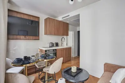 Cuisine ou kitchenette dans l'établissement Appart'Hôtel Lou Suites