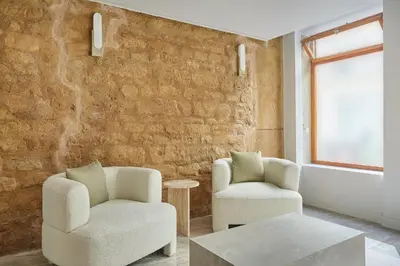 Coin salon dans l'établissement Appart'Hôtel Lou Suites