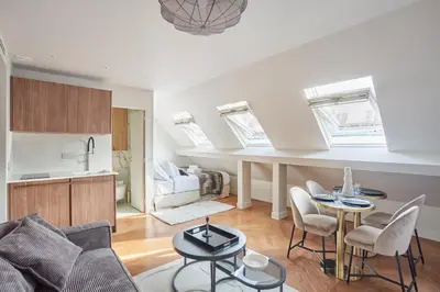Cuisine ou kitchenette dans l'établissement Appart'Hôtel Lou Suites