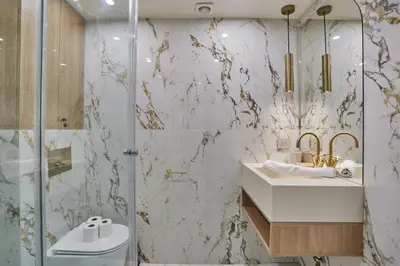 Salle de bains dans l'établissement Appart'Hôtel Lou Suites