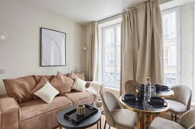 Coin salon dans l'établissement Appart'Hôtel Lou Suites
