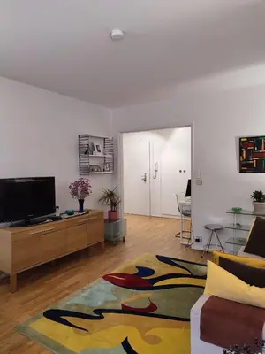 Télévision ou salle de divertissement dans l'établissement Appartement Paris Montparnasse
