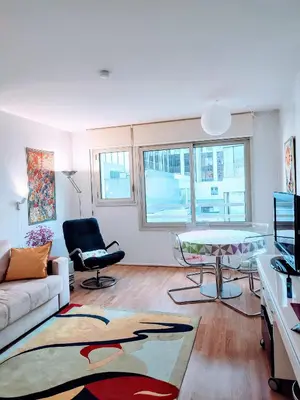 Télévision ou salle de divertissement dans l'établissement Appartement Paris Montparnasse