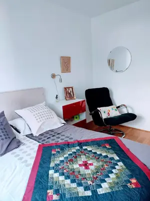 Un ou plusieurs lits dans un hébergement de l'établissement Appartement Paris Montparnasse