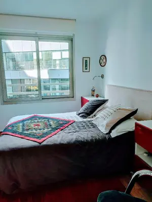 Un ou plusieurs lits dans un hébergement de l'établissement Appartement Paris Montparnasse