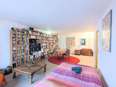 Un ou plusieurs lits dans un hébergement de l'établissement Grand appartement et cosy Paris