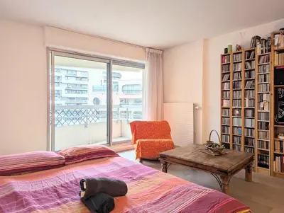 Un ou plusieurs lits dans un hébergement de l'établissement Grand appartement et cosy Paris