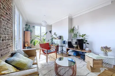 Coin salon dans l'établissement Bright apartment in Mouzaïa Paris 19th arrondissement