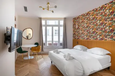 Un ou plusieurs lits dans un hébergement de l'établissement Chic Paris Studio for 2 in Bastille