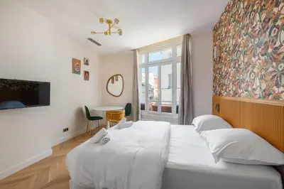 Un ou plusieurs lits dans un hébergement de l'établissement Chic Paris Studio for 2 in Bastille