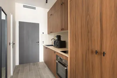 Cuisine ou kitchenette dans l'établissement Spacious Cosy Apartment for 2 Bastille Paris