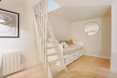 Un ou plusieurs lits dans un hébergement de l'établissement Apartment ideally located in Paris 15