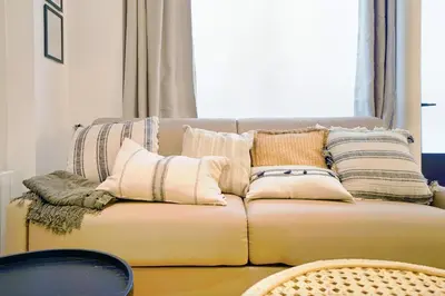 Coin salon dans l'établissement Apartment ideally located in Paris 15