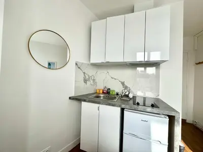 Cuisine ou kitchenette dans l'établissement New 355 Suite Celine- Cosy Apartment Paris Center