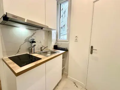 Cuisine ou kitchenette dans l'établissement New 411 Suite Charles- Cosy Apartment Paris Center