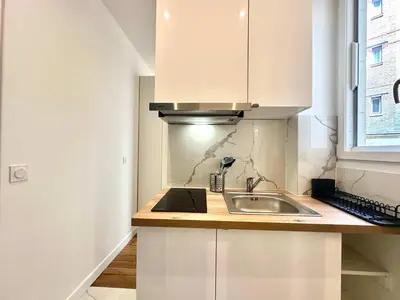 Cuisine ou kitchenette dans l'établissement New 411 Suite Charles- Cosy Apartment Paris Center