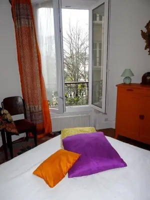 Un ou plusieurs lits dans un hébergement de l'établissement Un nid très calme et chaleureux a Montmartre !