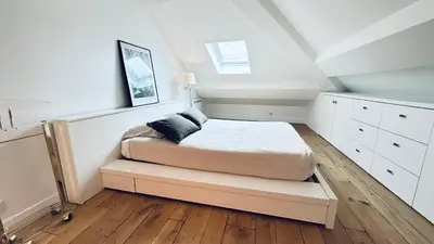 Un ou plusieurs lits dans un hébergement de l'établissement One Room - Last Floor - Vendôme / Madeleine