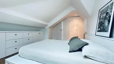Un ou plusieurs lits dans un hébergement de l'établissement One Room - Last Floor - Vendôme / Madeleine