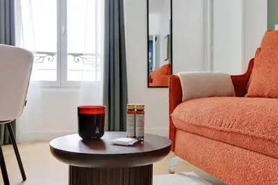 Coin salon dans l'établissement Appartements Ramey