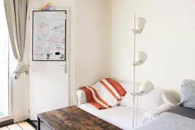 Un ou plusieurs lits dans un hébergement de l'établissement Studio lumineux avec balcon Porte de Versailles