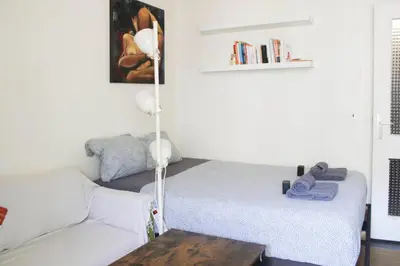 Un ou plusieurs lits dans un hébergement de l'établissement Studio lumineux avec balcon Porte de Versailles