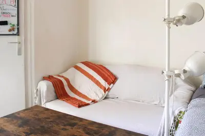 Un ou plusieurs lits dans un hébergement de l'établissement Studio lumineux avec balcon Porte de Versailles