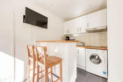 Cuisine ou kitchenette dans l'établissement Petit cocon parisien - Métro au pied - Alexandre Dumas