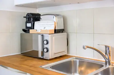 Cuisine ou kitchenette dans l'établissement Petit cocon parisien - Métro au pied - Alexandre Dumas