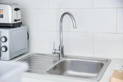 Cuisine ou kitchenette dans l'établissement Studio Urbain tout équipé - Face au Métro 2
