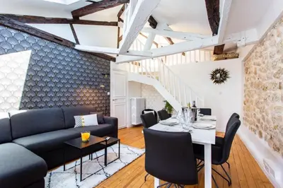 Coin salon dans l'établissement Welcoming apartment - 2BR 6P - Sentier
