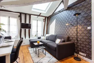 Coin salon dans l'établissement Welcoming apartment - 2BR 6P - Sentier