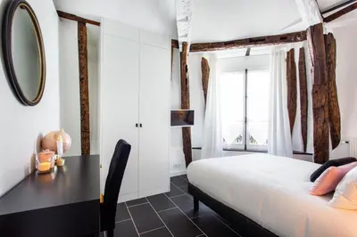 Un ou plusieurs lits dans un hébergement de l'établissement Welcoming apartment - 2BR 6P - Sentier