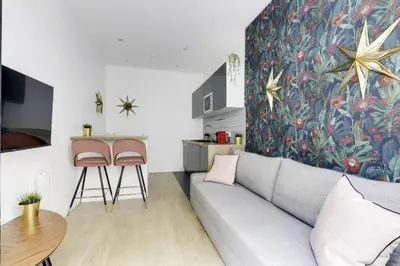 Coin salon dans l'établissement Charming duplex apartment near Montmartre