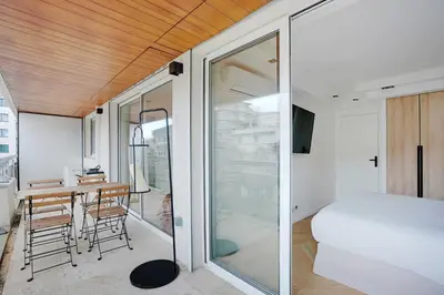 Un ou plusieurs lits dans un hébergement de l'établissement Charming Apt with AC & balcony