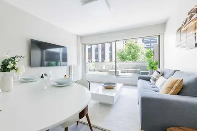 Coin salon dans l'établissement Superbe Appartement 1BDR - 2P Porte Maillot