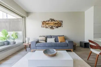 Coin salon dans l'établissement Superbe Appartement 1BDR - 2P Porte Maillot