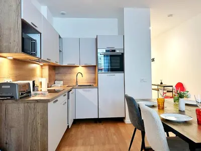 Cuisine ou kitchenette dans l'établissement Celine 28 Appartement au 16eme arrondissement, Victor hugo Prestige