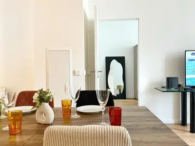 Télévision ou salle de divertissement dans l'établissement Celine 28 Appartement au 16eme arrondissement, Victor hugo Prestige