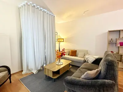 Coin salon dans l'établissement Celine 28 Appartement au 16eme arrondissement, Victor hugo Prestige