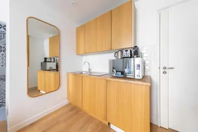 Cuisine ou kitchenette dans l'établissement Charming studio - 2P - Ternes 17th