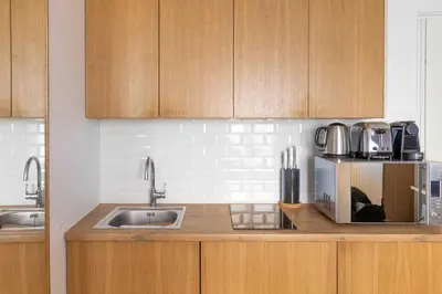 Cuisine ou kitchenette dans l'établissement Charming studio - 2P - Ternes 17th