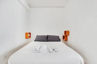 Un ou plusieurs lits dans un hébergement de l'établissement Nice studio 2P Champs de Mars - La Motte Picquet