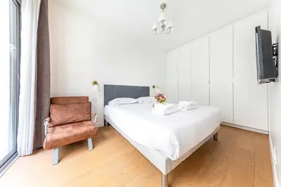 Un ou plusieurs lits dans un hébergement de l'établissement Superb apartment - 2BDR - 4P - Champs-Élysées
