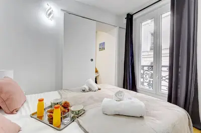 Un ou plusieurs lits dans un hébergement de l'établissement TBS 340 - Superb apartment in Paris 10