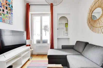 Coin salon dans l'établissement Appt 1BDR - 3P near Roland-Garros - Boulogne