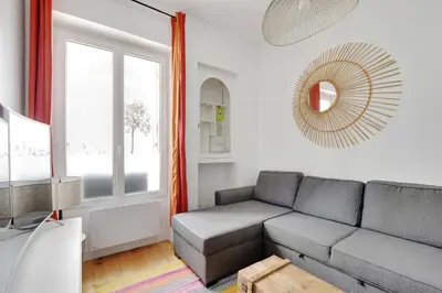 Coin salon dans l'établissement Appt 1BDR - 3P near Roland-Garros - Boulogne