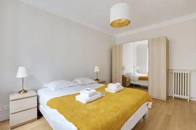 Un ou plusieurs lits dans un hébergement de l'établissement Modern apartment 1BDR - 4P à Boulogne Billancourt