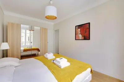 Un ou plusieurs lits dans un hébergement de l'établissement Modern apartment 1BDR - 4P à Boulogne Billancourt